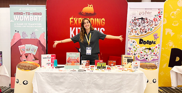 Exploding Kittens booth display at an event