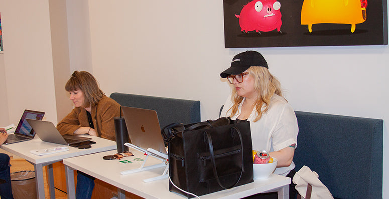 People working at desks in an office 