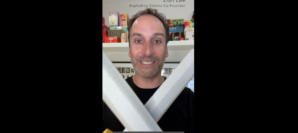 Man in a video thumbnail with arm in a sling 