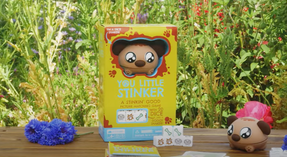 Catchables plush and game box on an outdoor table 