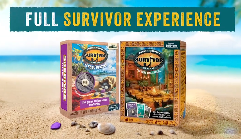Full Survivor Experience two game boxes on a beach 